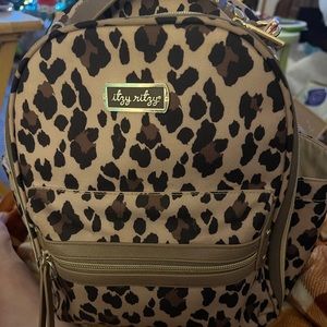 Itzy ritzy bag with packing cube and paci pod